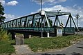 Čeština: Most přes řeku Odru v centru města Oława, Polsko English: A bridge over the Oder river in the very center of the town of Oława, Poland