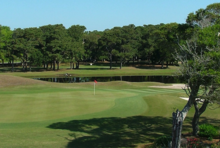 View looking north at the OIGC 18th green Oak Island Golf Club-18th Hole.png