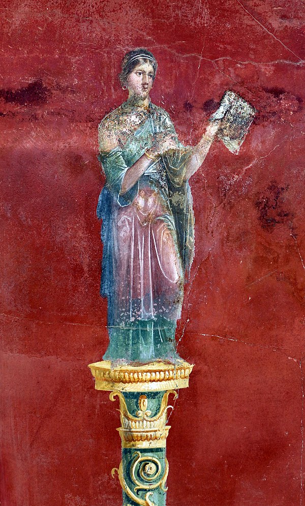 Clio on an antique fresco from Pompeii