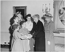 Bess Truman with Girl Scouts and their leaders Photograph of First Lady Bess Truman at the White House with a delegation of Girl Scouts, who are presenting her with... - NARA - 200404.jpg