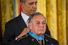 Rodela receives the Medal of Honor at a White House ceremony on March 18, 2014. President Barack H. Obama, left, presents a Medal of Honor to former U.S. Army Master Sgt. Jose Rodela during a ceremony March 18, 2014, in the White House in Washington, D.C. The former Soldier received 140318-A-KH856-008.jpg