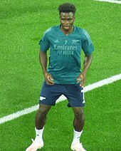 Saka warming up for Arsenal in 2023 RC Lens - Arsenal FC (03-10-2023) 16.jpg