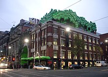 The "green brain" of Building 22 (Singer Building) on the Melbourne City campus RMIT University at twilight.jpg