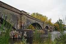 Conon railway bridge is skewed, and the staggered narrow arches used to achieve this can be clearly seen. Railway viaduct, Conon Bridge (geograph 6647582).jpg