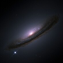 SN 1994D supernoba. Eztanda egitarakoan, NGC 4526 galaxia baino distiratsuagoa bihurtu zen.
