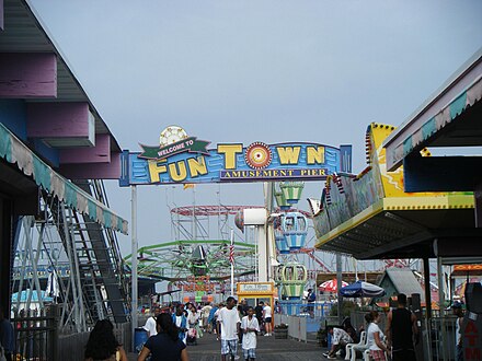 Walk along the boardwalk in Seaside Heights