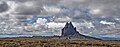 Shiprock formation in New Mexico, USA showing the 5-mille long dike radiating to the south.