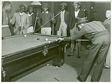 Young African-American men at a pool hall in Clarksdale, Mississippi, 1939. Shooting pool on Saturday afternoon, Clarksdale, Mississippi... (3110573042).jpg