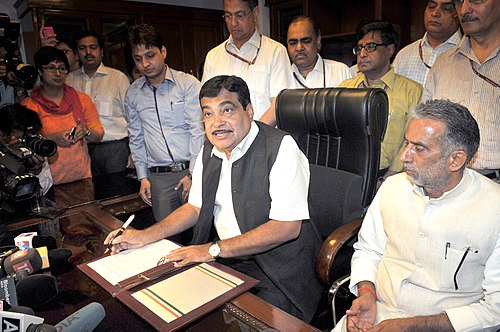 Gadkari taking charge as the Union Minister for Road Transport and Highways and Shipping, in New Delhi on 29 May 2014.
