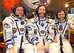 Soyuz TMA-21 crew in front of the capsule-2.jpg