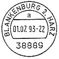 Két körös bélyegző alul elhelyezett szöveg léccel