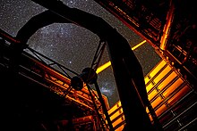 Laser guide stars assist in the elimination of atmospheric distortion. The new PARLA laser in operation at ESO's Paranal Observatory.jpg