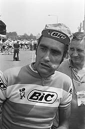 A picture of a cyclist in a jersey that reads "Bic."