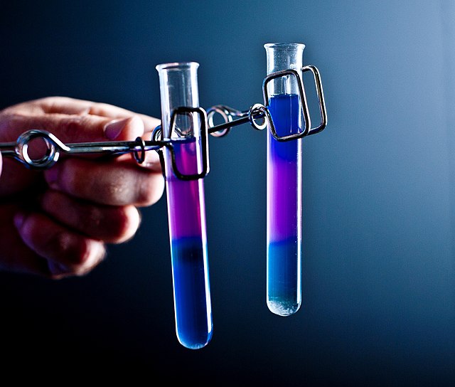 File:Two small test tubes held in spring clamps.jpg - Wikipedia