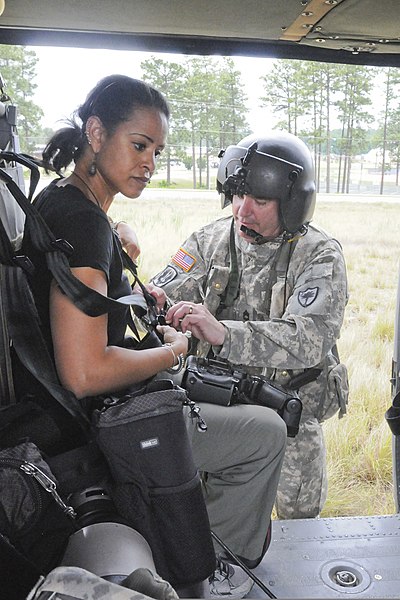 File:U.S. Army Sgt. 1st Class Robert McConnell, right, a crew chief with the South Carolina Army National Guard, straps Kim Foster-Tobin, a photographer with The State newspaper, into a UH-60 Black Hawk helicopter 130516-Z-WS267-003.jpg