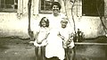 Vesta Zook Slagel With Two Orphans (9671947033).jpg