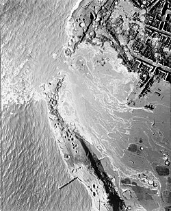 Aerial picture of the breach in the sea dike at Westkapelle after the 3 October 1944 bombardment. Walcheren, Holland, Royal Air Force Bomber Command, 1942-1945 C4668.jpg