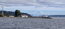 West Point Lighthouse with Mount Rainier behind, from the Argosy Locks Cruise boat, August 2016. West Point Lighthouse with Ranier.jpg