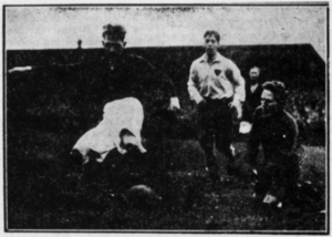 Match action during the 1927 KBUs Pokalturnering final -- showing BK Frem's back Carl Johansen at work. Behind him, B.93's forward, Borge Morch, with BK Frem's goalkeeper Niels Hansen on his knees. 1927 KBUs Pokalturnering final match action.png