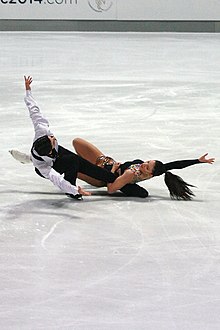 Alisa Agafonova and Alper Ucar perform a hydroblade, a choreographic element in ice dance 2013 Nebelhorn Trophy Alisa Agafonova Alper Ucar IMG 6257.JPG