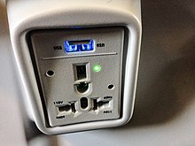 International AC outlet and USB charger in an airplane Alaska Airlines International Power Outlets.jpg