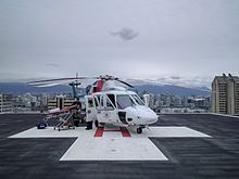 BCEHS critical care team on the helicopter pad on the top of Vancouver General Hospital following the offloading of a patient BCEHSHeli2017.jpg