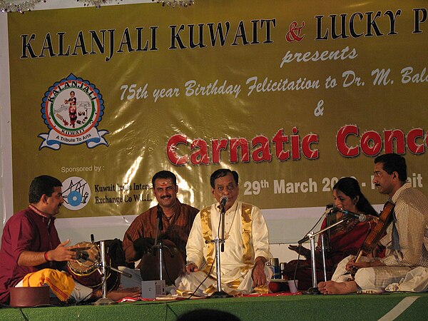 Balamuralikrishna during a concert in Kuwait on 29 March 2006, accompanied by Mavelikkara Sathees Chandran (violin), Perunna G. Harikumar (mridangam),