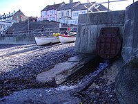 The outfall of Beeston Beck on Sheringham's east beach Beeston becks outfall on Sheringham beach.JPG