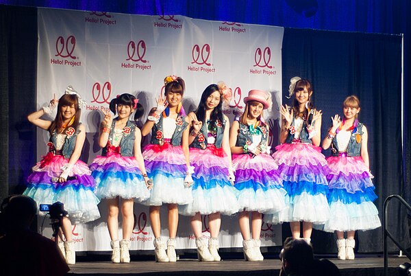 Berryz Kobo in 2012. From left to right: Shimizu, Tsugunaga, Tokunaga, Sudo, Natsuyaki, Kumai, and Sugaya.