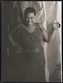 Bessie Smith, three-quarter length portrait, standing, facing front, with left hand raised LCCN2004663575.jpg