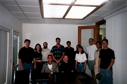 The staff of Wales' Internet company Bomis photographed in summer 2000. Wales is third from the left in the back row, with Christine Rohan.