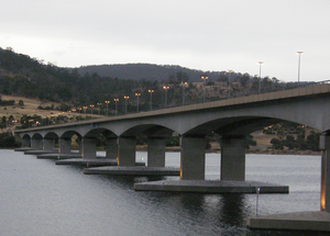 The Bowen Bridge, completed in 1984, provides an alternative crossing of the Derwent River between Risdon Cove and Glenorchy, 10 km to the north of the Tasman Bridge. Bowen Bridge Dawn.png
