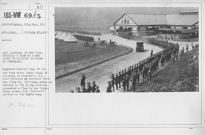 File:Boy's Activities - Junior Camp Association - Gov. Whitman, of New York, presents a flag to Cadet Corps in Miltiary Training at Peekskill. Eighteen hundred boys of the New York state Cadet Corps in training in Pee(...) - NARA - 20808680.jpg