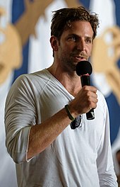 Cooper speaking during a United Service Organizations tour in 2009 Bradley Cooper, July 2009 (cropped 2).jpg
