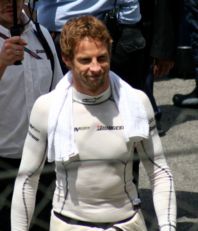 Jenson Button donning fireproof underwear