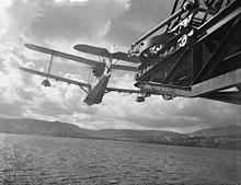 Catapult Training For Fleet Air Arm Pilots. HMS Pegasus is used as a Catapult Training Ship For Fleet Air Arm Personnel. Lamlash, Scotland, September 1942. A Supermarine Walrus being catapulted. It leaves the ship at about 70mph Catapult Training For Fleet Air Arm Pilots. HMS Pegasus, Originally Named HMS Ark Royal, Is Now USED As a Catapult Training Ship For Fleet Air Arm Personnel. Lamlash, Scotland, September 1942. A12032.jpg