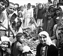 Alawites celebrating at a festival in Baniyas, Syria during World War II. Celebrating Alawites.jpg