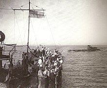 The crew of HMS Grampus cheering the surfaced E11 after a successful attack, 1915. Cheering E11.jpg