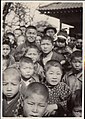 Crowds of Japanese boys and a few girls (1915 by Elstner Hilton).jpg