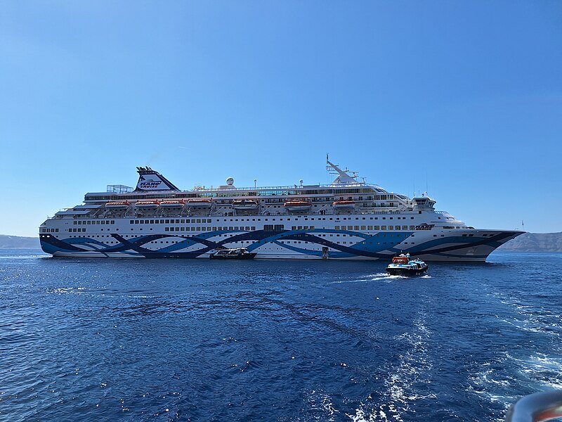 File:Crown Iris at Santorini (Picture taken from a small boat taking passangers to the port).jpg