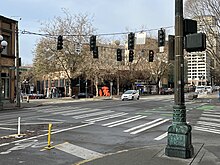 A typical pedestrian crossing with white stripes in Seattle in 2022 December 2022 - Seattle 19.jpg