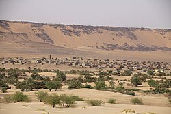Tichit, with Dhar Tichitt escarpment in the background