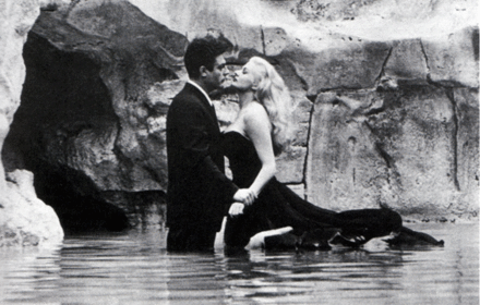 Mastroianni and Anita Ekberg in the Trevi Fountain, Rome, during the shooting of La Dolce Vita (1960)