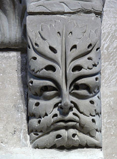 Green Man Sculpture or other representation of a face surrounded by or made from foliage