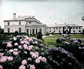 Dupont Estate - flowers in forefront with house in the back (5168303306).jpg