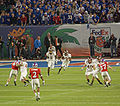 Virginia Tech's Eddie Royal fields and returns the opening kickoff of the game.