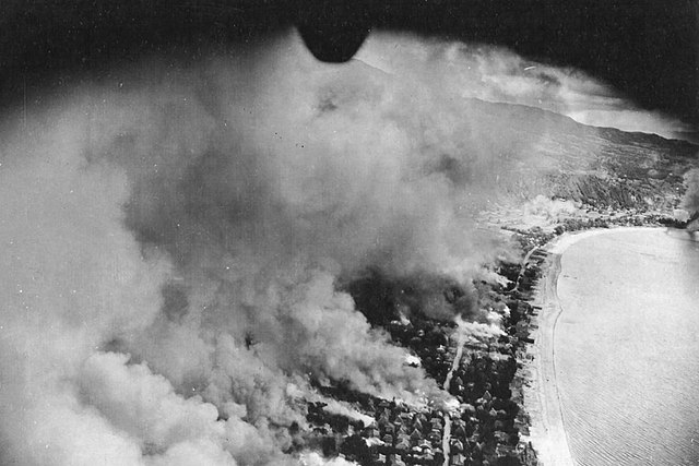 The Tarumiza district of Kagoshima burns after B-29 air raids on the city, 17 Jun 1945