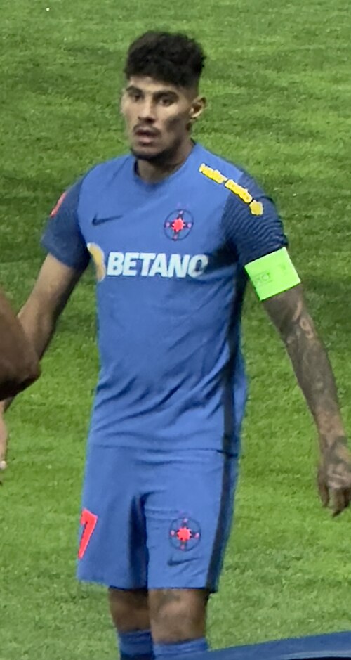 Coman playing away at Petrolul Ploiești in October 2022, a 2–0 win in which he scored.