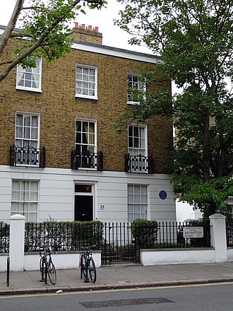 The English Heritage blue plaque commemorating George Goodwin at 24 Alexander Square GEORGE GODWIN - 24 Alexander Square South Kensington London SW3 2AU.jpg