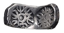 "Bent bar" minted under Achaemenid administration, of the type found in large quantities in the Chaman Hazouri hoard and the Bhir Mound hoard in Taxila. Gandhara bent bar.jpg